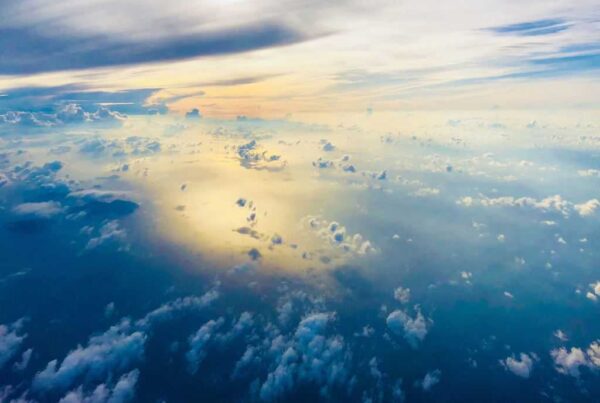 A view from a plane of clouds in the sky