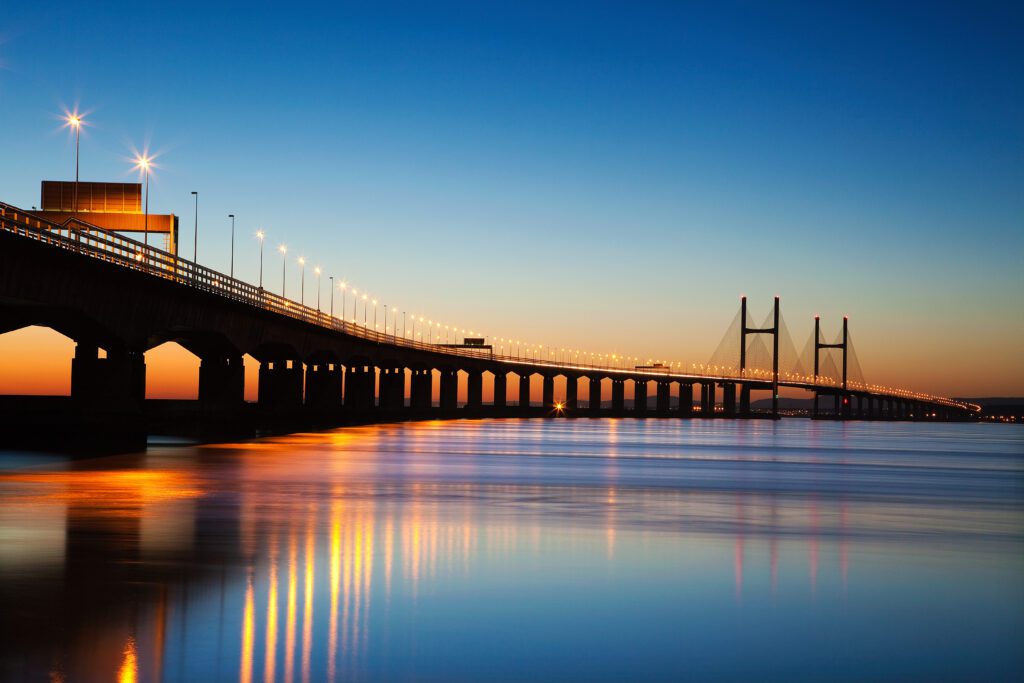 Severn bridge at dusk with lights reflecting