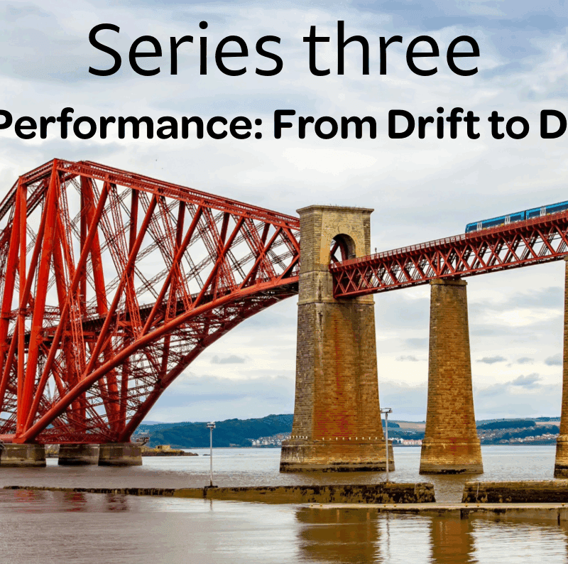 Big red iron bridge across a river for the portfolio performance article
